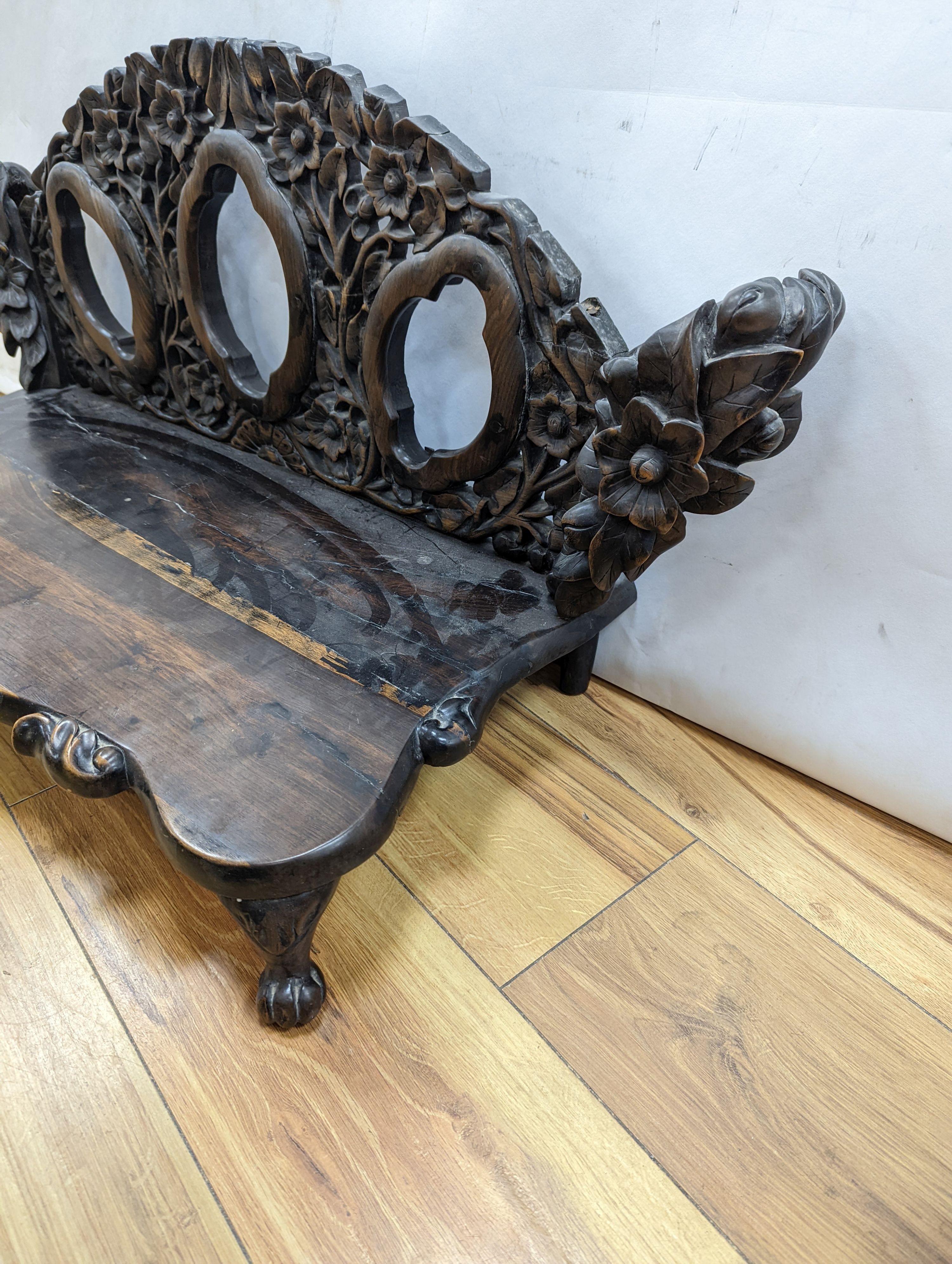 An early 20th century Chinese carved hardwood stand 85cm wide